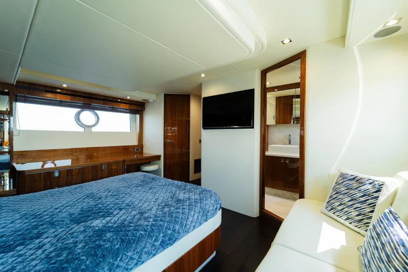 Slide: The Image of Luxurious bedroom interior of 2016 Sunseeker Manhattan 65 yacht with modern amenities. - 26