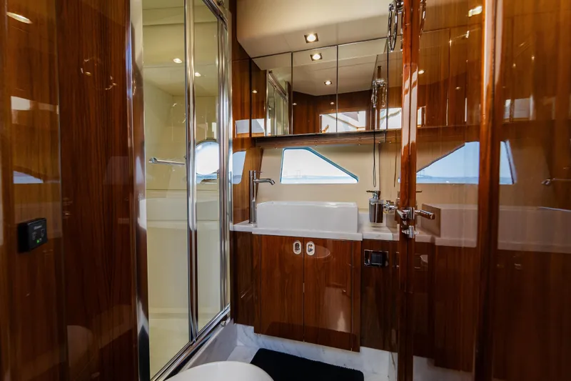 Slide: The Image of Luxurious bathroom interior of 2016 Sunseeker Manhattan 65 yacht with wood finishes. - 36