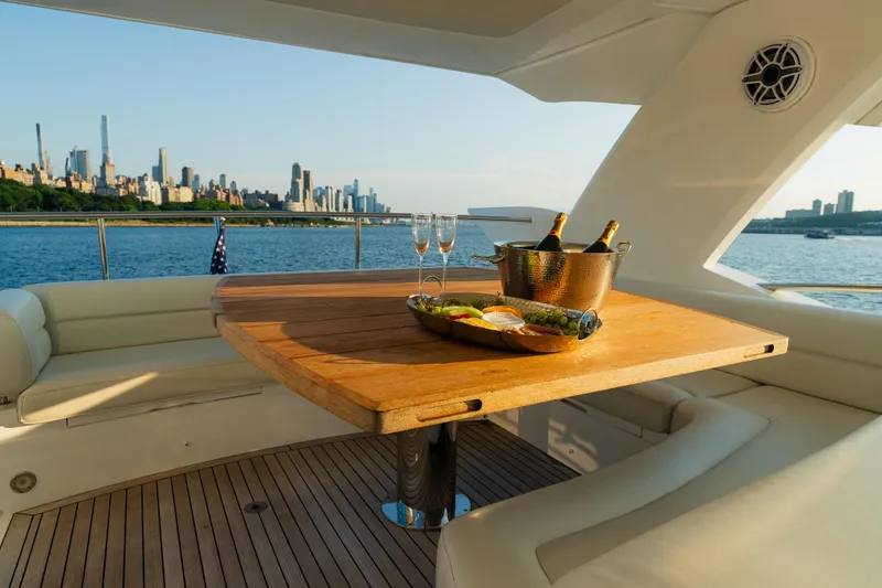 Slide: The Image of Luxurious Sunseeker Manhattan 65 yacht deck with city skyline view, 2016 model. - 38