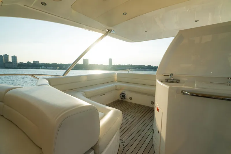 Slide: The Image of Luxurious 2016 Sunseeker Manhattan 65 yacht interior with waterfront view at sunset. - 42