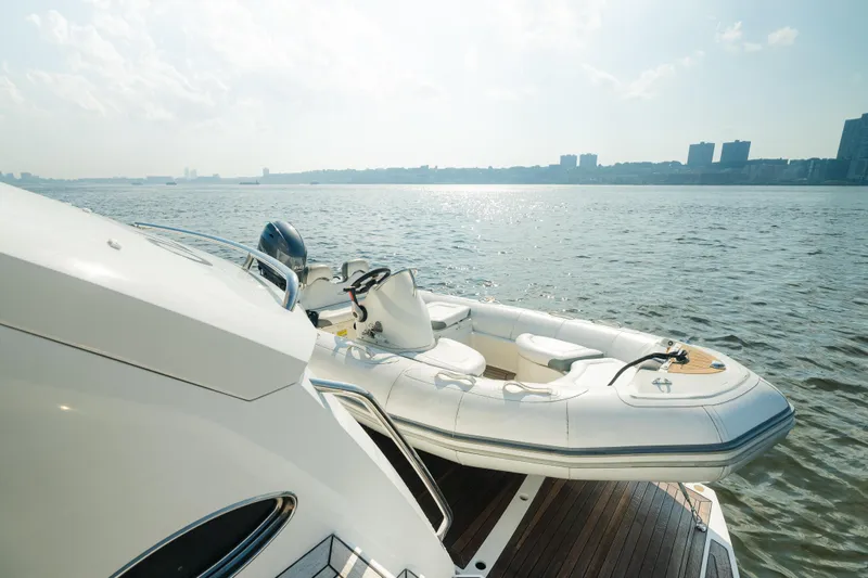 Slide: The Image of Luxury Sunseeker Manhattan 65 yacht with tender on calm waters, 2016 model. - 48