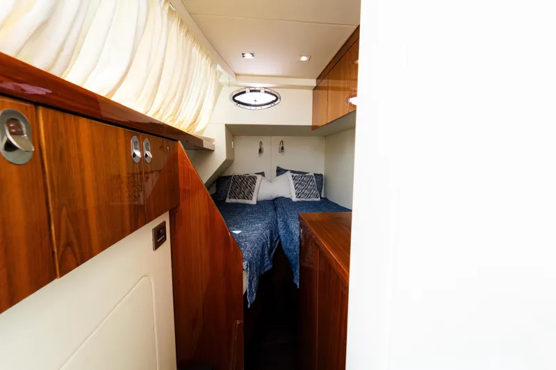 Slide: The Image of Luxurious cabin interior of 2016 Sunseeker Manhattan 65 yacht with elegant wood finish. - 49