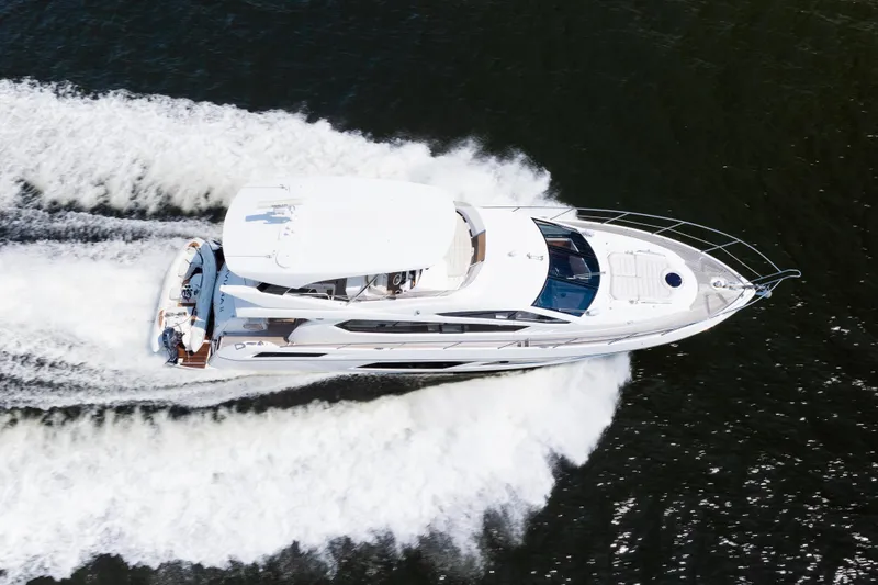 Slide: The Image of Aerial view of 2016 Sunseeker Manhattan 65 yacht cruising on water. - 56