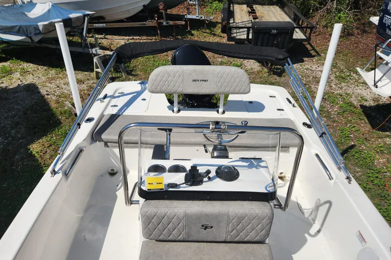 Slide: The Image of 2021 Sea Pro 172 Bay boat interior with seating and steering console. - 12