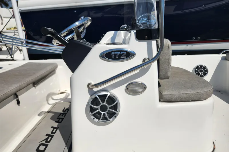 Slide: The Image of 2021 Sea Pro 172 Bay boat console with steering wheel and seating. - 17