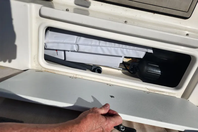 Slide: The Image of Storage compartment of a 2021 Sea Pro 172 Bay boat, showing equipment and accessories. - 19