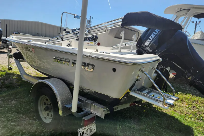 Slide: The Image of 2021 Sea Pro 172 Bay boat on trailer with Suzuki outboard motor. - 3