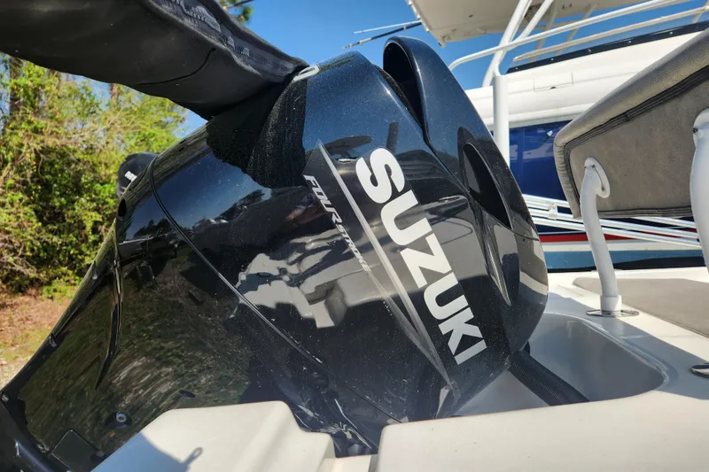 Slide: The Image of Suzuki outboard motor on 2021 Sea Pro 172 Bay boat, close-up view. - 8