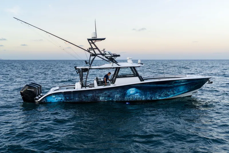 The Image of 2023 Yellowfin 42 Offshore boat on open sea at sunset. - 0