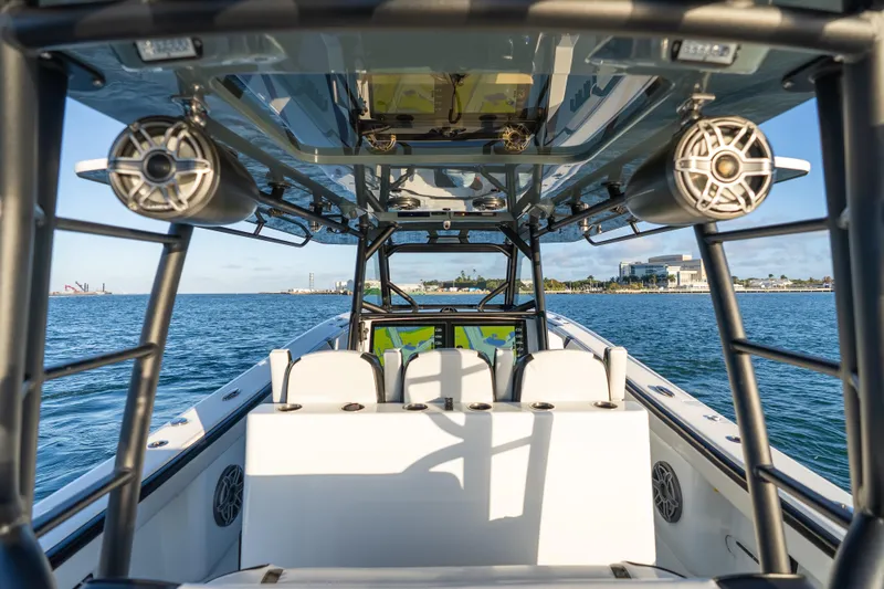 Slide: The Image of 2023 Yellowfin 42 Offshore boat interior with ocean view and modern equipment. - 26