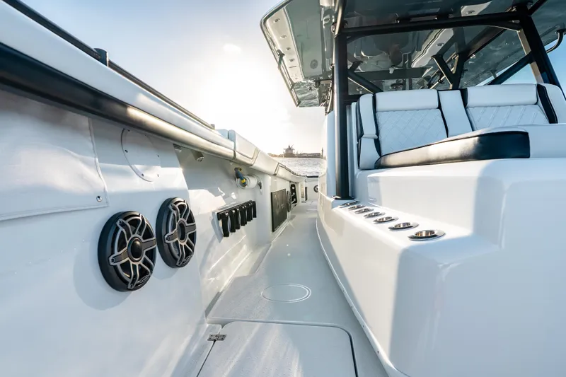 Slide: The Image of 2023 Yellowfin 42 Offshore boat interior with sleek seating and modern design. - 31