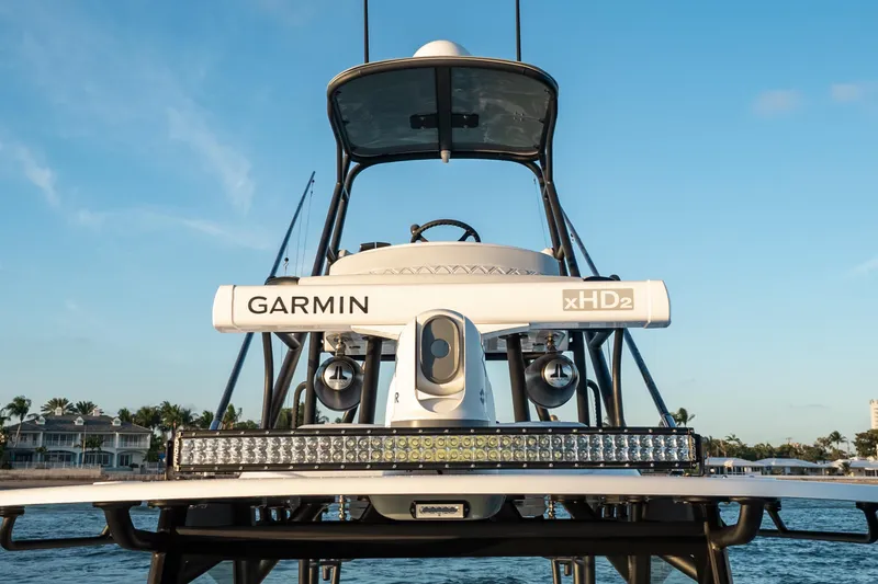 Slide: The Image of 2023 Yellowfin 42 Offshore boat with Garmin xHD2 radar on water. - 51