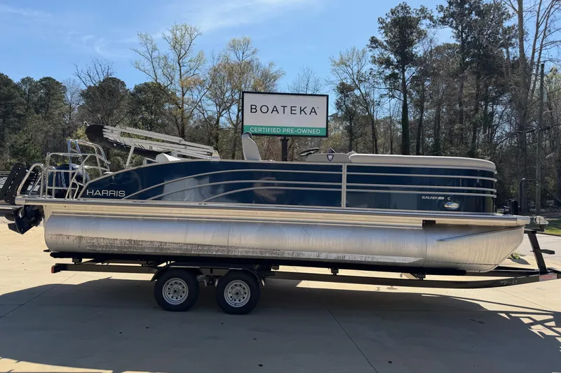 The Image of 2025 Harris Sunliner 230 pontoon boat on trailer at Boateka dealership. - 0