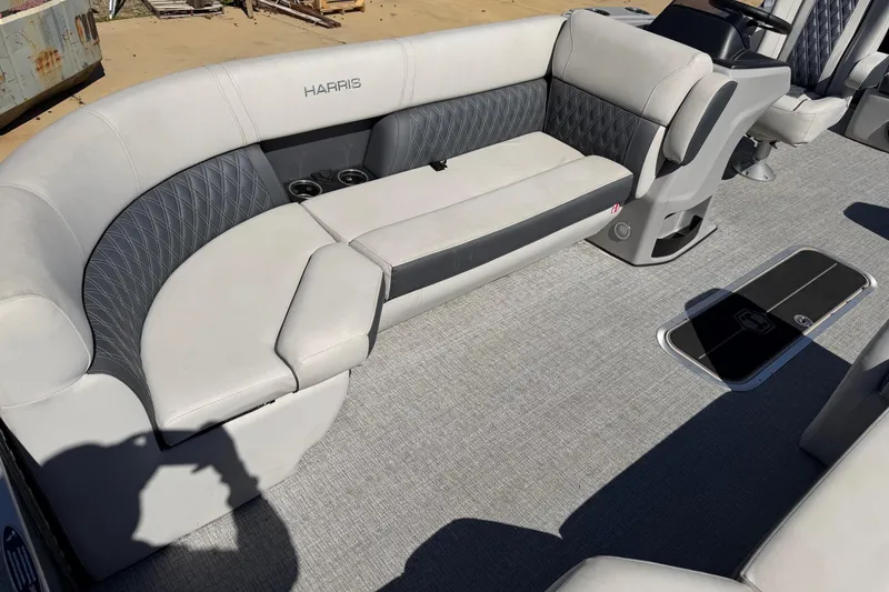 Slide: The Image of Luxurious seating on 2025 Harris Sunliner 230 pontoon boat with elegant upholstery. - 5