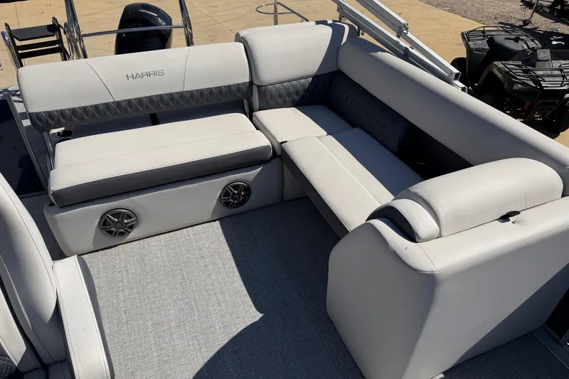 Slide: The Image of Luxurious seating on 2025 Harris Sunliner 230 pontoon boat with stylish upholstery. - 9