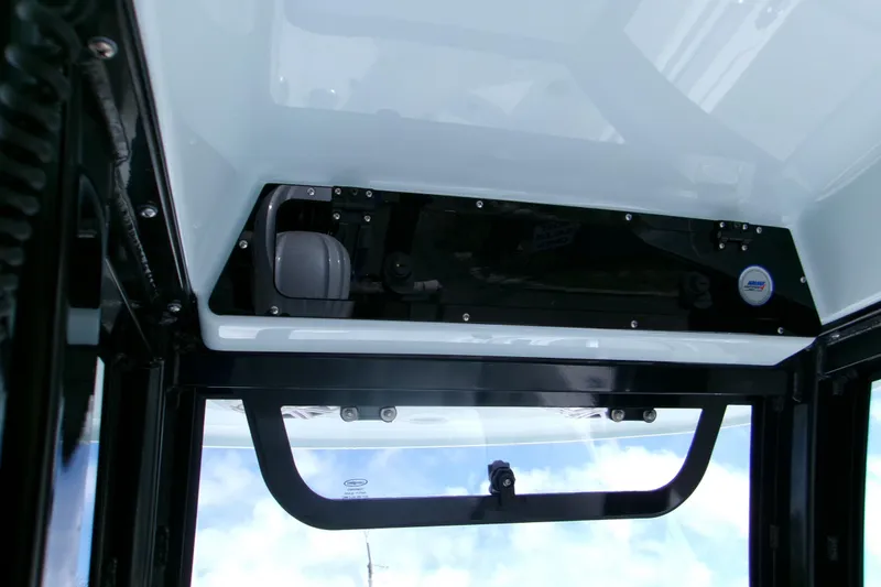 Slide: The Image of 2026 Sportsman Open 232 Center Console boat interior, featuring sleek design and modern equipment. - 11