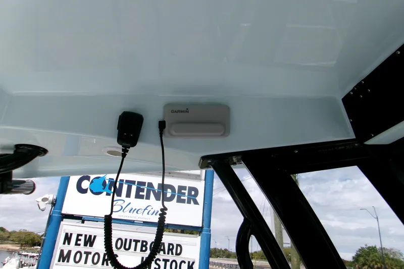 Slide: The Image of 2026 Sportsman Open 232 Center Console with Garmin device, viewed from below. - 20