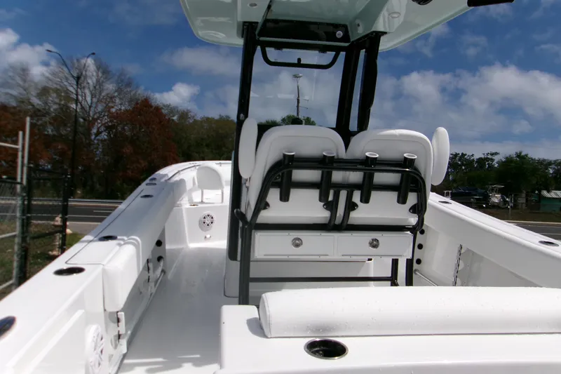 Slide: The Image of 2026 Sportsman Open 232 Center Console boat interior with seating and storage. - 7