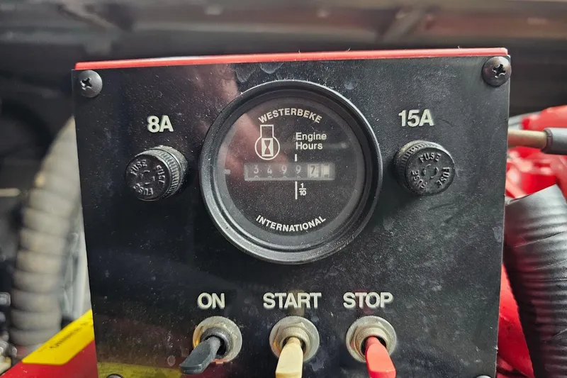 Slide: The Image of Westerbeke engine hour meter showing 3499.7 hours on a Lakeview 16x60, 2002 model. - 49