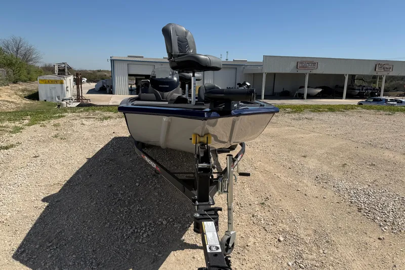 Slide: The Image of 2021 Tracker Pro 170 boat on trailer in outdoor dealership lot. - 5