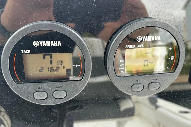 Slide: The Image of Yamaha gauges on a 2019 Tidewater 210 LXF boat dashboard display RPM and fuel data. - 11