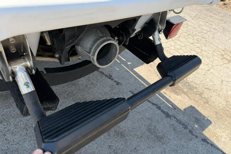 Slide: The Image of Rear view of 2022 Yamaha WaveRunner VX Cruiser with footrests and exhaust detail. - 13