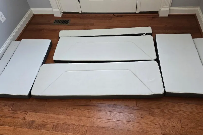 Slide: The Image of Cushions for 2020 Beneteau Barracuda 27 boat on wooden floor. - 6