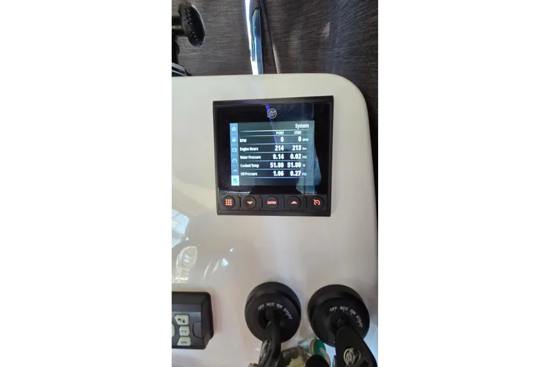 Slide: The Image of Dashboard display of a 2020 Beneteau Barracuda 27 boat showing engine metrics. - 7