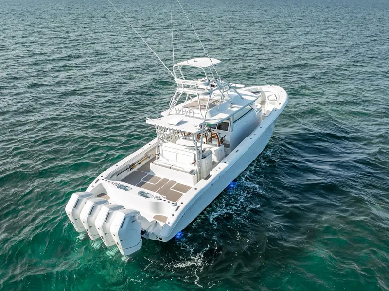 Slide: The Image of 2023 Yellowfin 54 boat cruising on open water. - 15