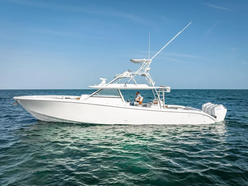 Slide: The Image of 2023 Yellowfin 54 boat on open water. - 2
