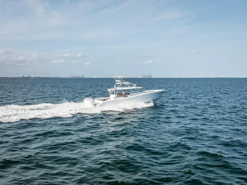 Slide: The Image of 2023 Yellowfin 54 boat cruising on open water. - 36