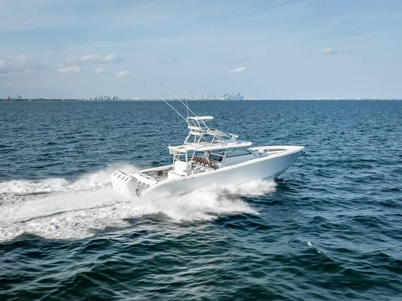 Slide: The Image of 2023 Yellowfin 54 boat cruising on open water. - 37