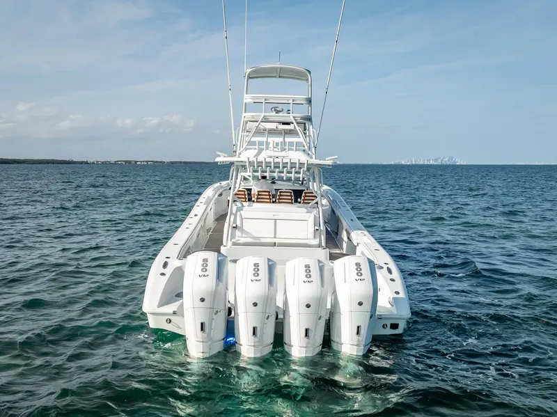 Slide: The Image of 2023 Yellowfin 54 boat with quad outboard engines on open water. - 39