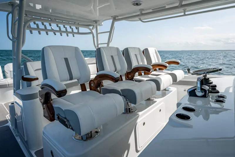 Slide: The Image of Luxurious seating on 2023 Yellowfin 54 boat with ocean backdrop. - 48