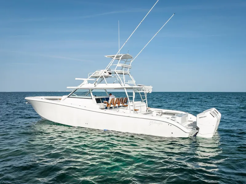 Slide: The Image of 2023 Yellowfin 54 boat on open water. - 8