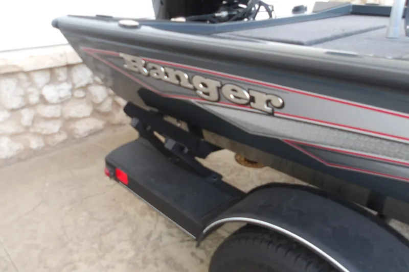 Slide: The Image of 2026 Ranger RT178 boat trailer with logo and red accents. - 12