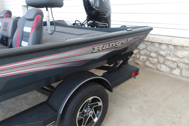 Slide: The Image of 2026 Ranger RT178 boat with sleek design and comfortable seating. - 3
