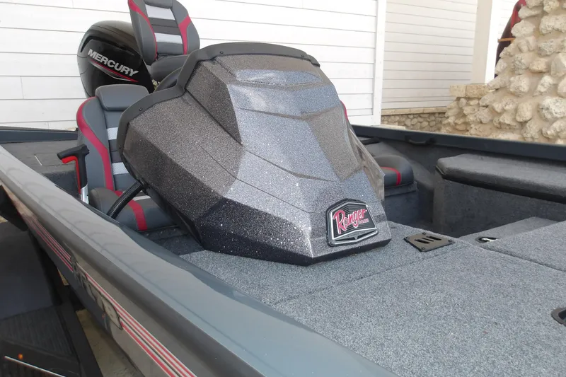 Slide: The Image of 2026 Ranger RT178 boat interior with Mercury engine, featuring sleek seating and modern design. - 10