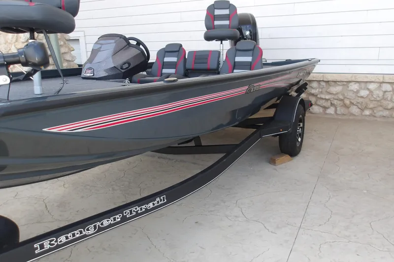Slide: The Image of 2026 Ranger RT178 boat on trailer, featuring sleek design and comfortable seating. - 2