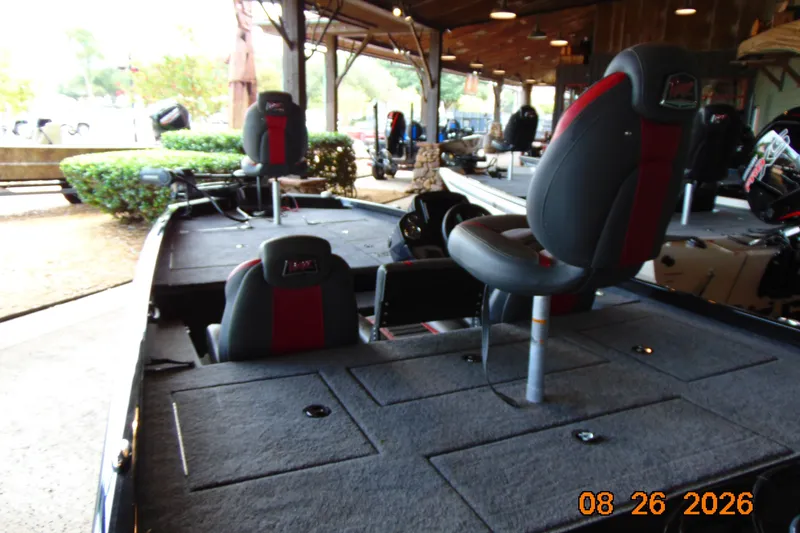 Slide: The Image of 2026 Ranger RT188P fishing boat interior with seating and storage compartments. - 1