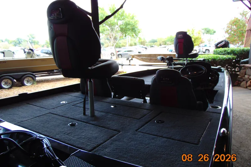 Slide: The Image of 2026 Ranger RT188P boat interior with seating and control console. - 4