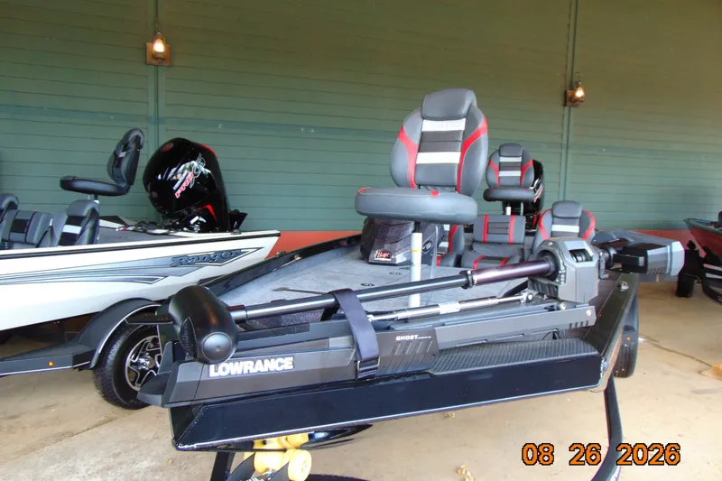 Slide: The Image of 2026 Ranger RT188P fishing boat with Lowrance equipment, displayed indoors. - 9