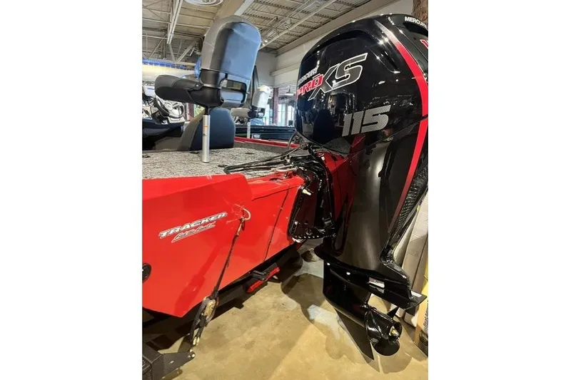 Slide: The Image of 2026 Tracker Pro Team 195 boat with Mercury 115 Pro XS engine in showroom. - 62