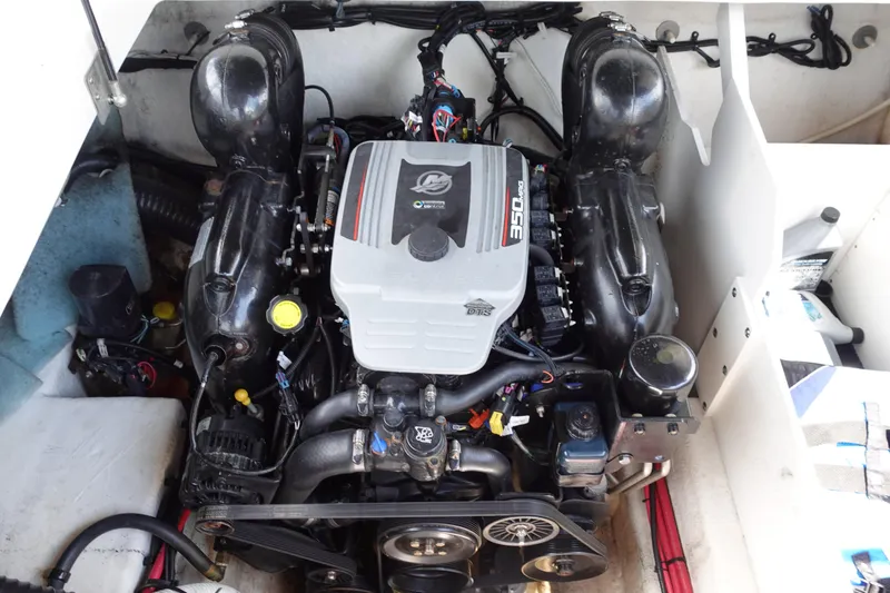 Slide: The Image of Engine of 2011 Sea Ray 260 Sundeck boat, showcasing detailed components and layout. - 14