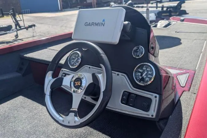 Slide: The Image of 2015 Ranger RT188 boat dashboard with Garmin GPS and steering wheel. - 3