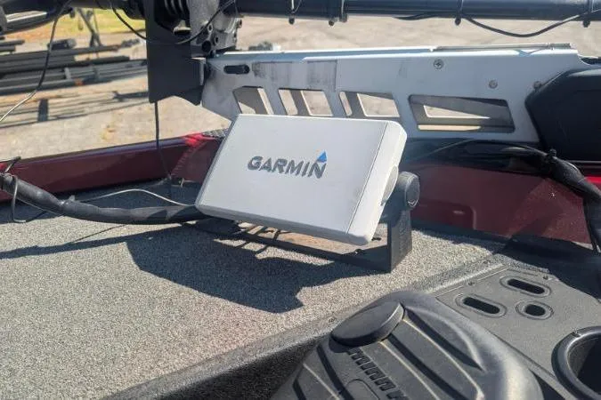 Slide: The Image of Garmin device mounted on 2015 Ranger RT188 boat dashboard in sunlight. - 5