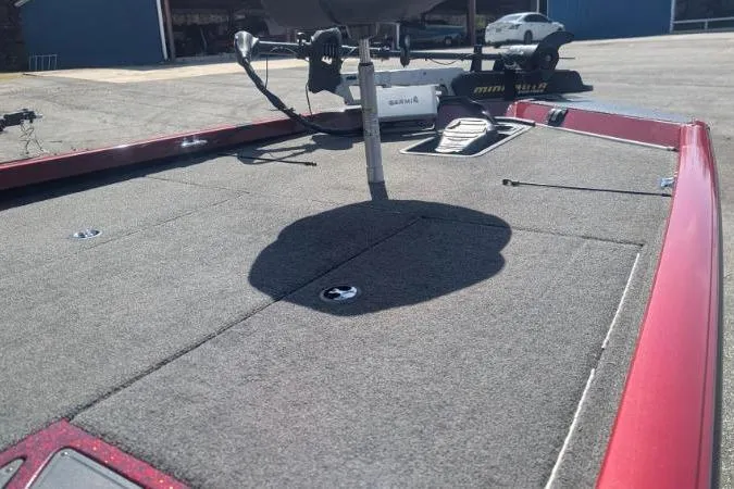 Slide: The Image of 2015 Ranger RT188 boat deck with fishing equipment and storage compartments. - 7