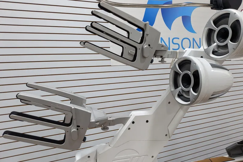 Slide: The Image of 2021 Malibu M240 boat tower with speakers and wakeboard racks. - 25