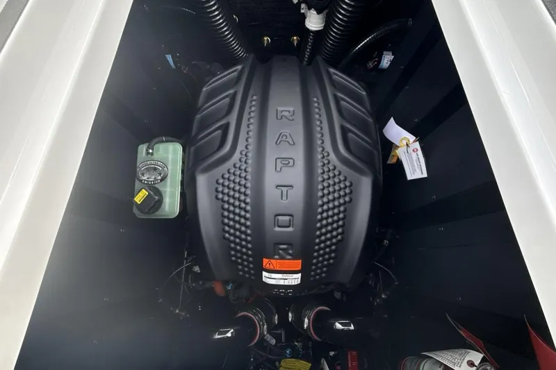 Slide: The Image of 2026 Moomba Max engine compartment featuring a Raptor engine cover. - 20