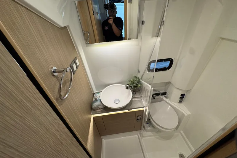 Slide: The Image of Modern bathroom interior on 2026 Jeanneau Leader 10.5 CC boat. - 16